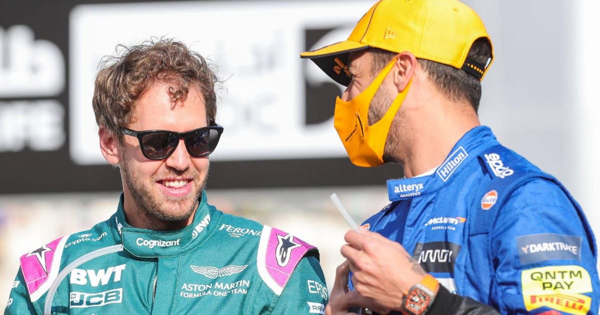 Sebastian Vettel and Daniel Ricciardo talk on the grid. Abu Dhabi, December 2021.
