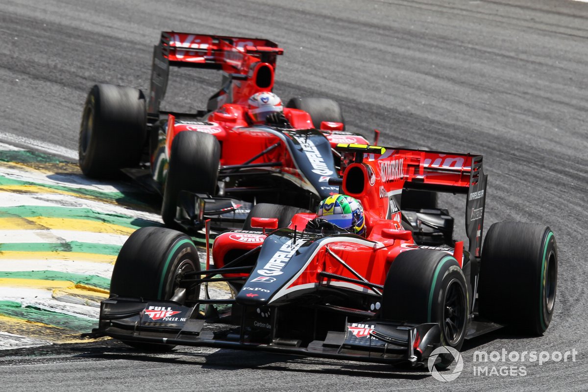 lucas-di-grassi-and-timo-glock-1.jpg